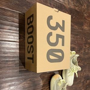 Yeezy 350 with box. Like new. 100% authentic. Feel free to ask.